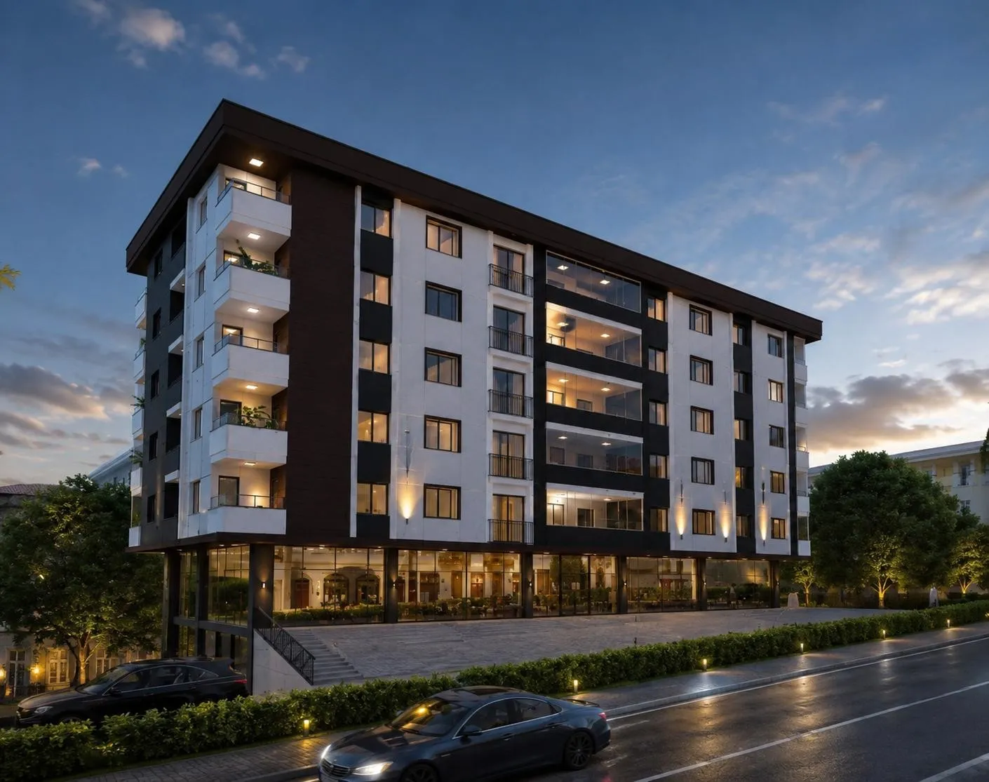 Akşam ışığında beyaz ve koyu kahve cepheli apartman görseli, altta camlı dükkânlar